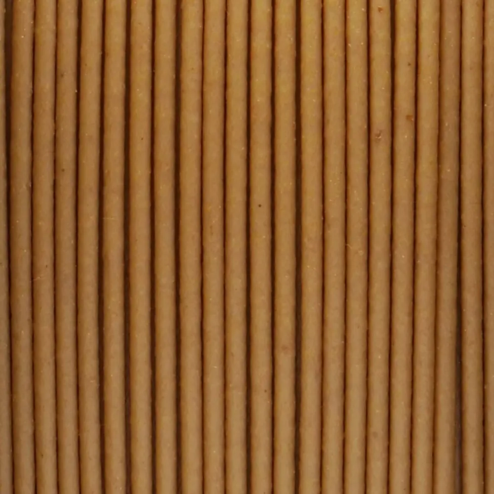 Vista macro del filamento WINKLE PLA WOOD Pino en tono marrón cálido