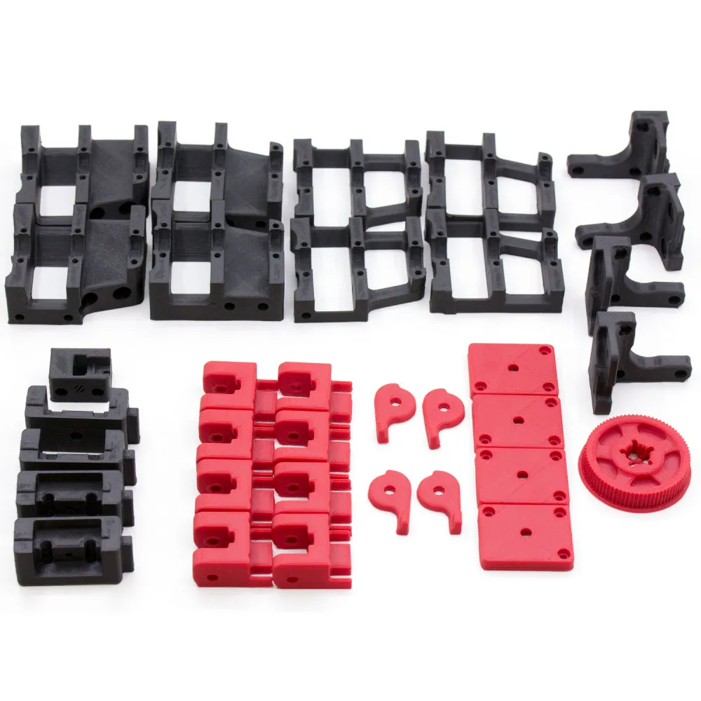Piezas impresas de las cuatro reducciones, tensores e idlers Z para Voron 2.4 r1